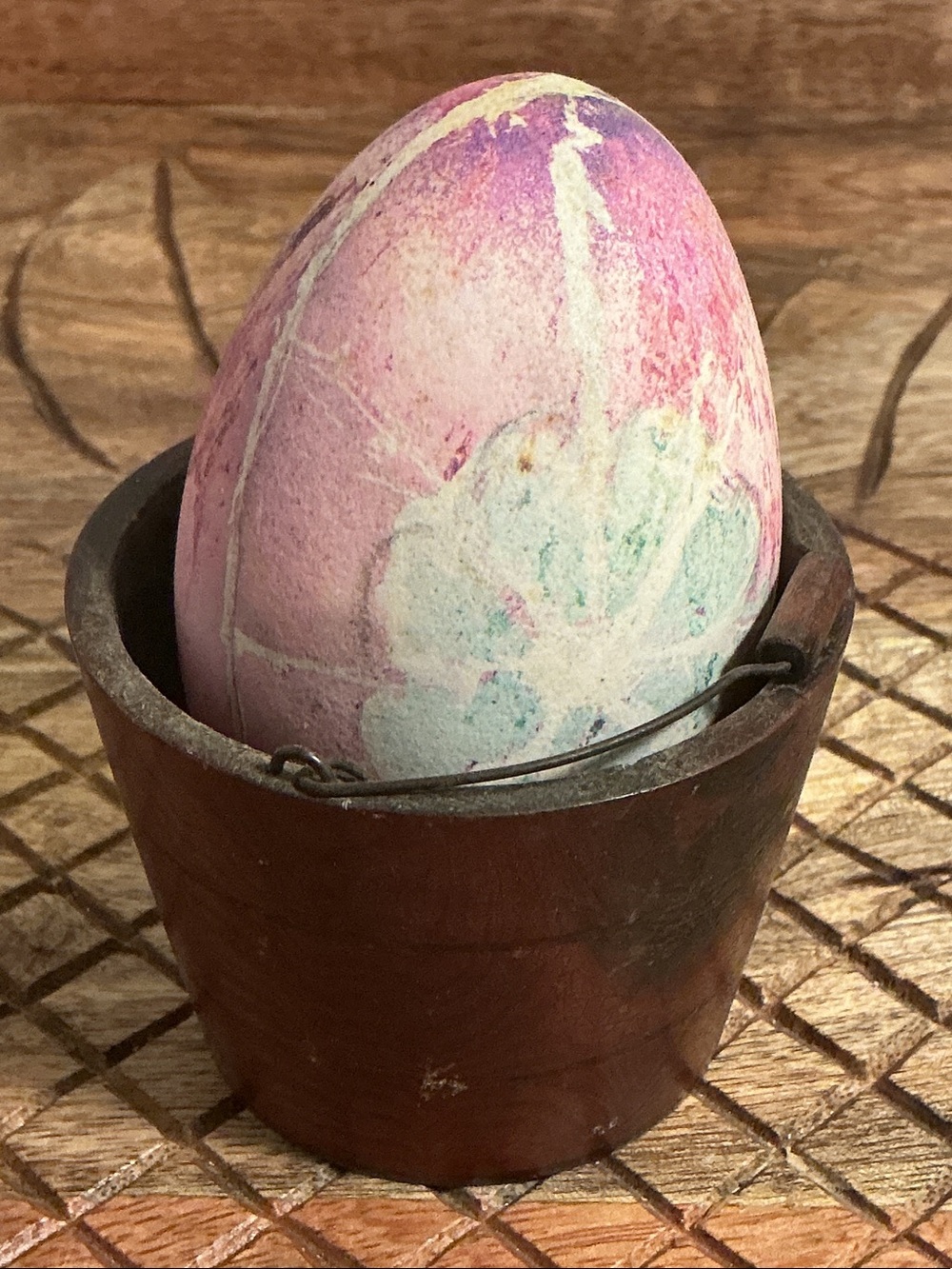 Decorative Pink Floral Egg Accent displayed in wooden bucket with handle
